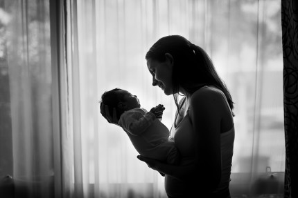 Mum admiring her baby: Sydney Newborn photographer