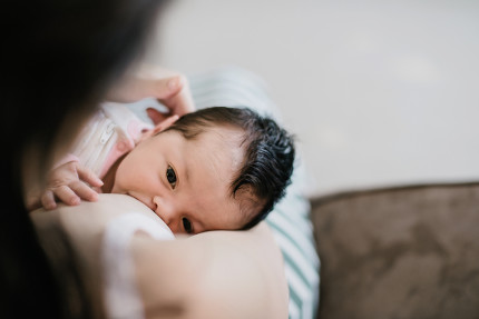 Newborn Photographer Sydney: Breastfeeding baby
